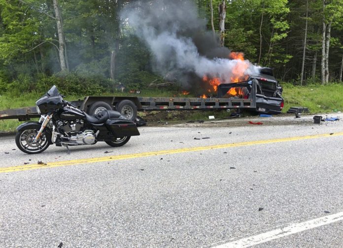 บิ๊กไบค์พุ่งชนรถพ่วง The cause of the deadly collision is not yet known. The pickup truck was on fire when emergency crews arrived. (Miranda Thompson via AP)