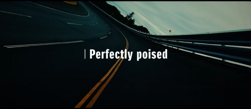 ภาพทีเซอร์รายละเอียดบางส่วนที่มีข้อความ Perfectly Poised ที่แปลว่า